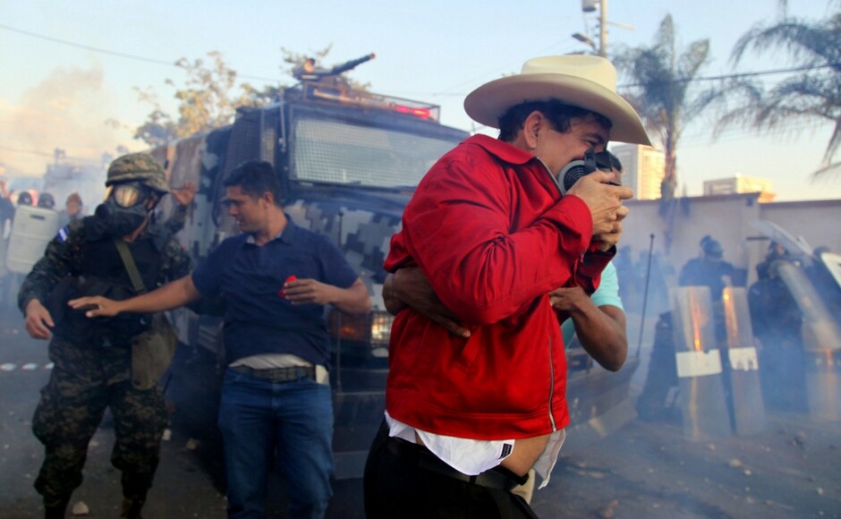 Hernandez was awarded the electoral win weeks after the November vote and a disputed vote tally. AP Protests against Honduran president Juan Orlando Hernandez's re-election turn violent