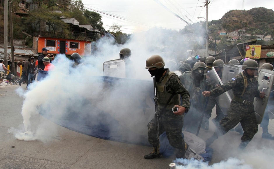 The government deployed police and soldiers to confront protesters. One demonstrator was shot dead dead on Saturday while seven others were detained. AP One killed in Honduras protests against re-election of President Juan Orlando Hernandez