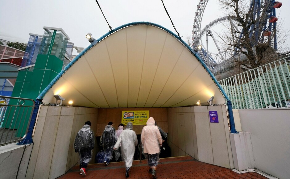 A park employee ran around, shouting 'a missile was launched, a missile was launched' as some 250 local residents and office workers duly evacuated to reinforced concrete buildings and a nearby subway station. AP Japan holds evacuation drill amid ongoing tensions over North Korea's nuclear programme