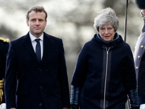 Theresa May, Emmanuel Macron ink new border security deal; UK to pay $62 million to France to stop migrants Theresa May, Emmanuel Macron ink new border security deal; UK to pay $62 million to France to stop migrants