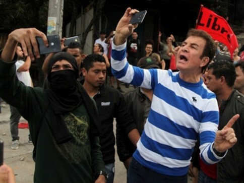 Hondurans organise nationwide protests against re-election of President Juan Orlando Hernandez Hondurans organise nationwide protests against re-election of President Juan Orlando Hernandez