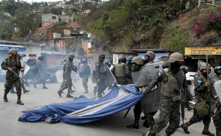 Activists blocked roads and clashed with police in Honduras as part of nationwide protests on Saturday against the contested re-election of President Juan Orlando Hernandez. AP One killed in Honduras protests against re-election of President Juan Orlando Hernandez