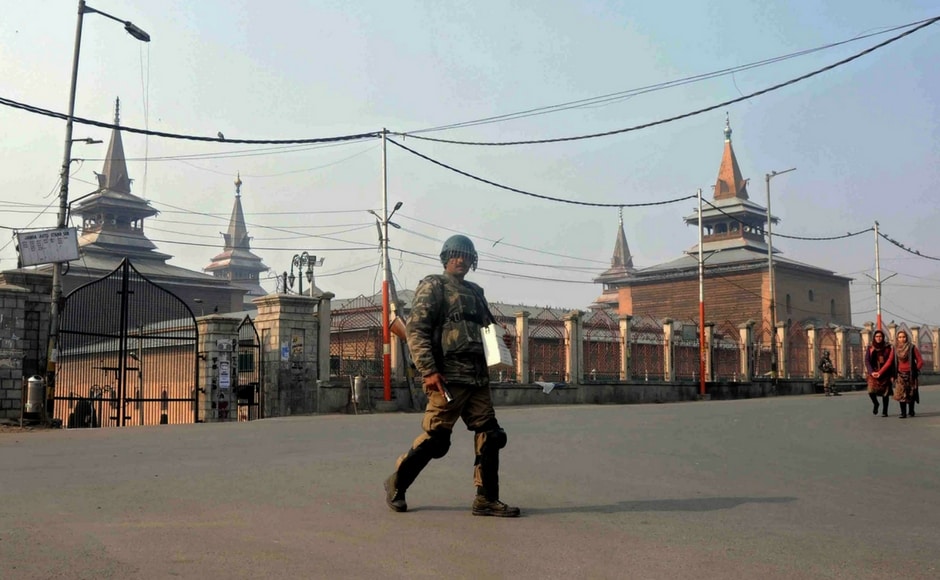 Huge number of security forces were deployed to prevent the possible eruption of protests. CRPF personnels guarded Jamia Masjid in Nowhatta area of Srinagar on Saturday. Image Courtesy: Sameer Mushtaq Jammu and Kashmir: Restrictions imposed due to strike called by Hurriyat leaders over civilian's death