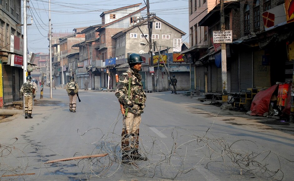Most of the main roads and streets remained closed, with barbed wire in place to prevent any vehicular and pedestrian movement. Image Courtesy: Sameer Mushtaq Jammu and Kashmir: Restrictions imposed due to strike called by Hurriyat leaders over civilian's death