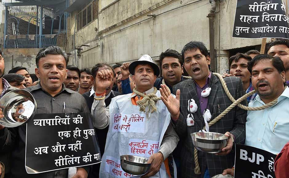 Traders took out a protest march in a number of markets, demanding that the sealing exercise be stopped immediately. Traders raise anti-government slogans at Chandni Chowk. PTI Traders took out a protest march in a number of markets, demanding that the sealing exercise be stopped immediately. Traders raise anti-government slogans at Chandni Chowk. PTI