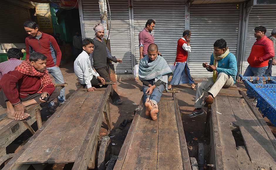The bandh called by Confederation of All India Traders (CAIT), an umbrella body of trade groups, affected markets in Chandni Chowk, Karol Bagh, Sadar Bazar, Kashmiri Gate, Bhagirath Place, Defence Colony, Green Park, among other areas. Workers sit outside closed shops during the Delhi trade bandh. PTI The bandh called by Confederation of All India Traders (CAIT), an umbrella body of trade groups, affected markets in Chandni Chowk, Karol Bagh, Sadar Bazar, Kashmiri Gate, Bhagirath Place, Defence Colony, Green Park, among other areas. Workers sit outside closed shops during the Delhi trade bandh. PTI