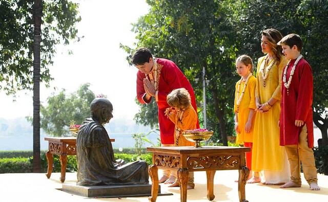 The first engagement of the Trudeau family, dressed in shades of festive yellow and red, was a visit to the Sabarmati Ashram. AP The first engagement of the Trudeau family, dressed in shades of festive yellow and red, was a visit to the Sabarmati Ashram. AP