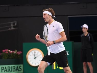Germany's Alexander Zverev celebrates winning a point against Australia's Alex de Minaur. Image courtesy: Twitter/@DavisCup