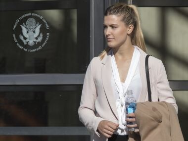 Tennis star Eugenie Bouchard leaves Brooklyn Federal court. AP