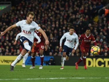 Tottenham Hotspur's Harry Kane takes a penalty against Liverpool at Anfield. AFP