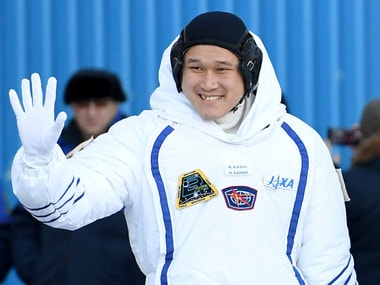 Japanese and US astronauts spacewalk for over five hours outside the ISS to repair robotic arm