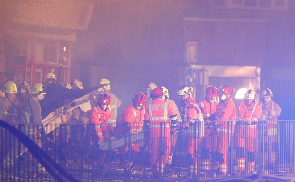 Pictures and videos posted on social media showed a property engulfed in flames visible from a distance, with rubble and debris scattered around. AP Pictures and videos posted on social media showed a property engulfed in flames visible from a distance, with rubble and debris scattered around. AP