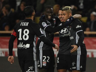 yon's Mariano celebrates scoring their first goal with teammates. Reuters