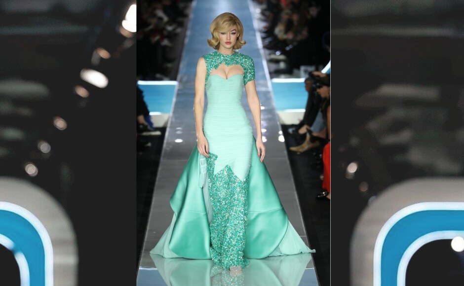 Moschino's Jeremy Scott's runway show at the Milan Fashion Week 2018 was an ode to the women of the 60s; namely Jackie Kennedy. Gigi Hadid walks the ramp for Moschino. Image from Twitter/@GigiHadidsNews Moschino's Jeremy Scott's runway show at the Milan Fashion Week 2018 was an ode to the women of the 60s; namely Jackie Kennedy. Gigi Hadid walks the ramp for Moschino. Image from Twitter/@GigiHadidsNews
