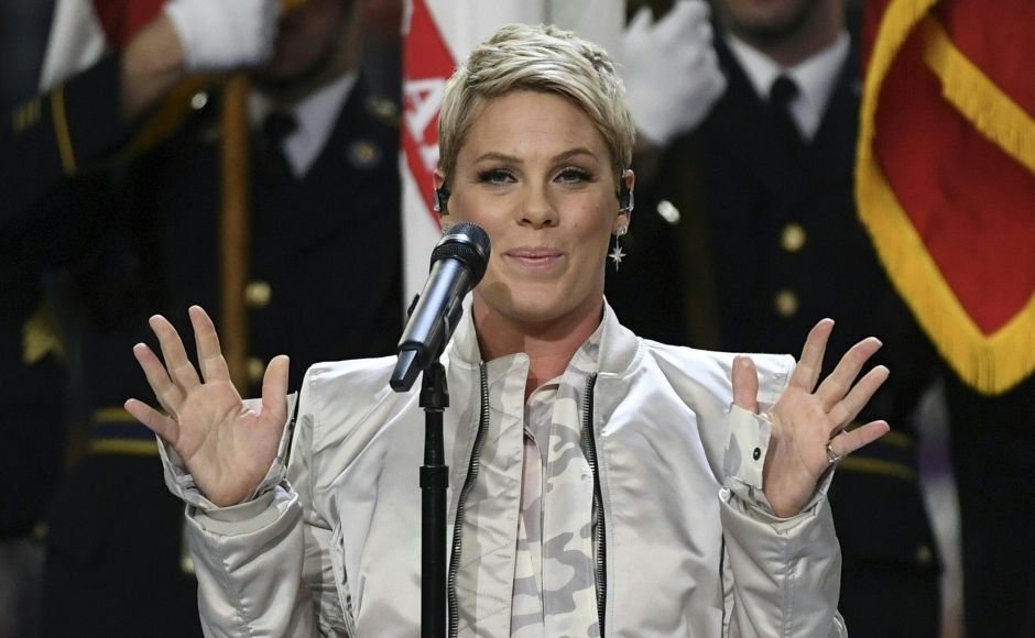 Pink sings the US National Anthem before the start of Super Bowl LII between the Philadelphia Eagles and the New England Patriots at US Bank Stadium in Minneapolis, Minnesota. AFP Pink sings the US National Anthem before the start of Super Bowl LII between the Philadelphia Eagles and the New England Patriots at US Bank Stadium in Minneapolis, Minnesota. AFP