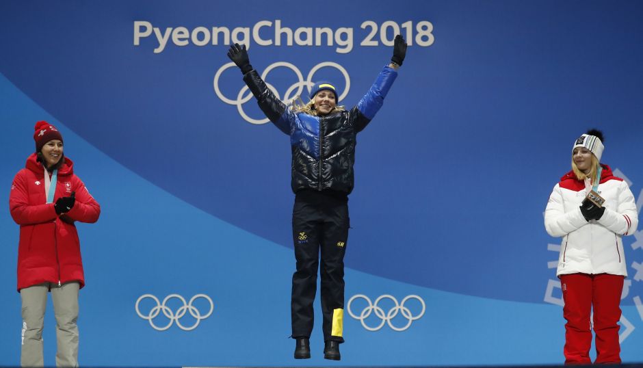 Gold medalist Frida Hansdotter of Sweden, silver medalist Wendy Holdener of Switzerland and bronze medalist Katharina Gallhuber of Austria on the podium after the women's slalom event. Hansdotter upstaged defending champion Mikaela Shiffrin as the American finished out the medals in fourth after vomiting.Reuters Michela Moioli, Frida Hansdotter among gold medallists on Day 7 of Winter Olympics