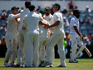Cricket - Australia v South Africa - First Test cricket match - WACA Ground, Perth, Australia - 3/11/16 - Australia's Josh Hazlewood celebrates with team mates after dismissing South Africa's Hashim Amla at the WACA Ground in Perth. REUTERS/David Gray - S1BEUKQGOKAB