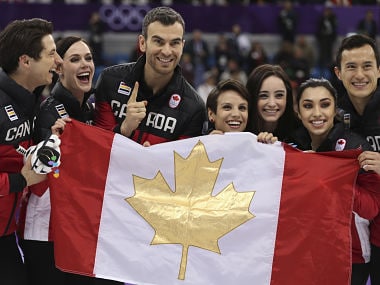 Figure Skating Pyeongchang 2018 Winter Olympics Team Event Ice Dance Free Dance competition final Gangneung Ice Arena - Gangneung, South Korea February 12, 2018 - Members of Team Canada pose after winning gold. REUTERS/Damir Sagolj - DEVEE2C0D84OJ