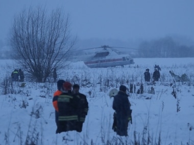 Emergency services work at the scene where a short-haul regional Antonov AN-148 plane crashed after taking off from Moscow's Domodedovo airport, outside Moscow, Russia February 11, 2018. REUTERS/Maxim Shemetov - UP1EE2B159LW5