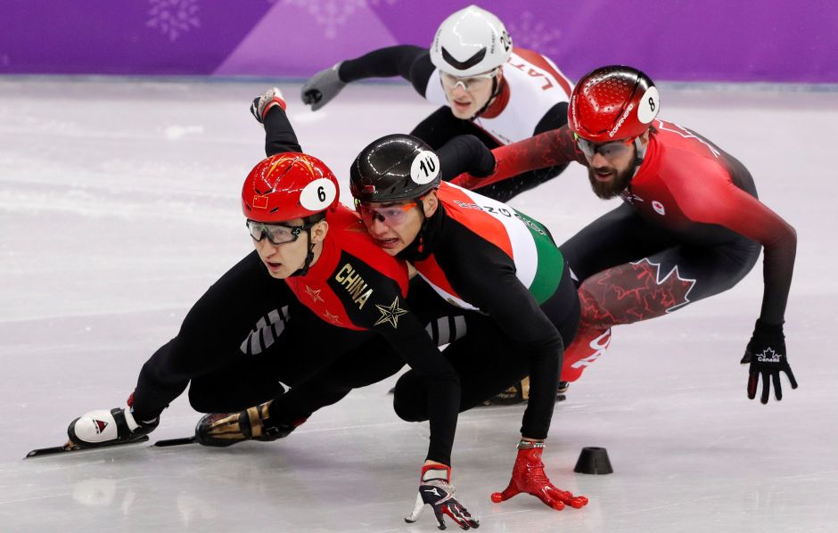 Wu Dajing of China leads in the men's quarter-final of 1,000m of short track speed skating. Reuters Wu Dajing of China leads in the men's quarter-final of 1,000m of short track speed skating. Reuters