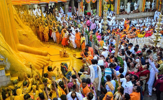The rituals began with a battery of priests and devotees carrying 108 'kalashas' (holy vessels) from the Digambara Jain mutt to the Vindyagiri hills, the venue of the event. PTI The rituals began with a battery of priests and devotees carrying 108 'kalashas' (holy vessels) from the Digambara Jain mutt to the Vindyagiri hills, the venue of the event. PTI
