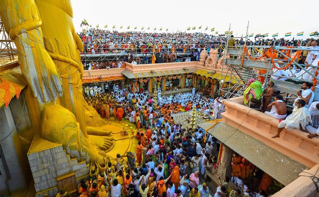 A visual spectacle was created, as the statue of Lord Gommateshwara Bahubali, the son of Adinath, the first of 24 Jain Tirthankaras, remained soaked in various hues used for Mahamastakabhisheka. PTI A visual spectacle was created, as the statue of Lord Gommateshwara Bahubali, the son of Adinath, the first of 24 Jain Tirthankaras, remained soaked in various hues used for Mahamastakabhisheka. PTI