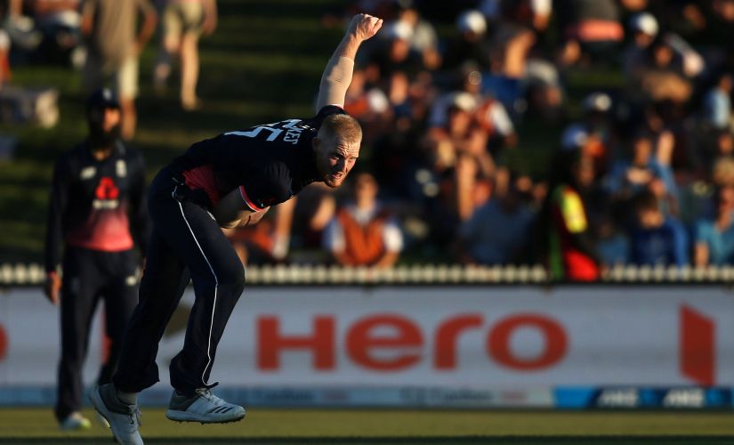 England's Ben Stokes bowls during the first ODI against New Zealand at Seddon Park in Hamilton on 25 February. AFP