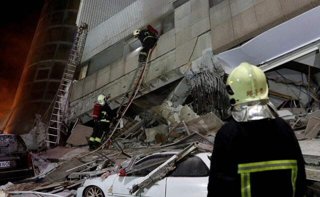 Four mobile cranes had been brought in on the back of trucks to help prop up the structure. Five more buildings including a hospital and a hotel were also damaged in the city, where roads were ripped apart and strewn with rubble. Reuters Four mobile cranes had been brought in on the back of trucks to help prop up the structure. Five more buildings including a hospital and a hotel were also damaged in the city, where roads were ripped apart and strewn with rubble. Reuters