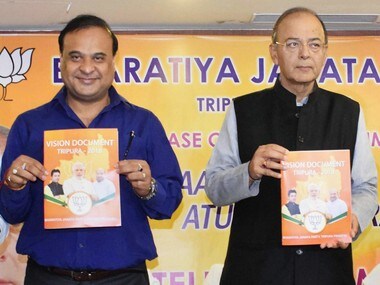 Himanta Biswa Sarma and Arun Jaitley unveiled BJP manifesto in Agartala on Sunday. PTI