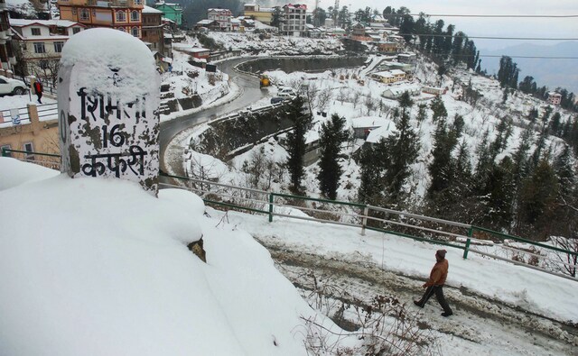 Popular tourist destinations Shimla and Manali continued to experience more snowfall on the second day on Tuesday, while lower hills across Himachal Pradesh were lashed by rain, bringing the temperature down by several notches. Tourist spots near Shimla like Kufri, Fagu and Narkanda also experienced snowfall, making the hill stations even more picturesque. PTI Popular tourist destinations Shimla and Manali continued to experience more snowfall on the second day on Tuesday, while lower hills across Himachal Pradesh were lashed by rain, bringing the temperature down by several notches. Tourist spots near Shimla like Kufri, Fagu and Narkanda also experienced snowfall, making the hill stations even more picturesque. PTI