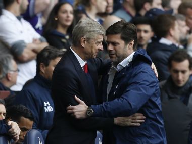 Arsenal's Arsene Wenger (left) and Tottenham Hotspur's Mauricio Pochettino greet each other. AFP