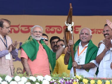 Narendra Modi with other state BJP leaders at the Davangere rally on Tuesday. Twitter @narendramodi