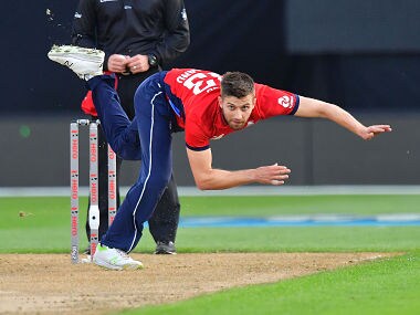 England's Mark Wood bowls during the first Twenty20 cricket match between New Zealand and England at Westpac Stadium in Wellington on February 13, 2018. / AFP PHOTO / Marty MELVILLE