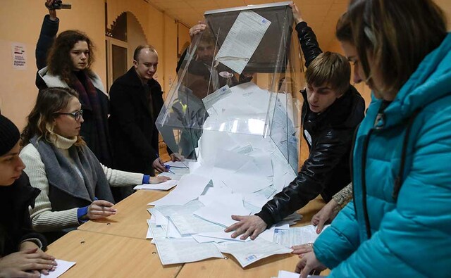 Near-final results released Monday showed that the other seven candidates were far behind Putin in Sunday's voting. AP Near-final results released Monday showed that the other seven candidates were far behind Putin in Sunday's voting. AP