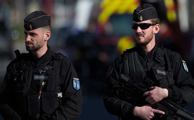 Named as Redouane Lakdim and said by security sources to have Moroccan nationality, the gunman first hijacked a car in Carcassonne, killing a passenger and injuring the driver, before shooting and injuring a policeman who was out jogging. French Police officers cordon off the area during an incident in Trebes. AP Named as Redouane Lakdim and said by security sources to have Moroccan nationality, the gunman first hijacked a car in Carcassonne, killing a passenger and injuring the driver, before shooting and injuring a policeman who was out jogging. French Police officers cordon off the area during an incident in Trebes. AP