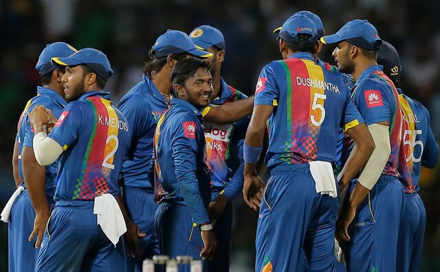 Sri Lanka spinner Akila Dananjaya dismissed both Indian openers Rohit Sharma and Shikhar Dhawan inside first four overs. AP Sri Lanka spinner Akila Dananjaya dismissed both Indian openers Rohit Sharma and Shikhar Dhawan inside first four overs. AP