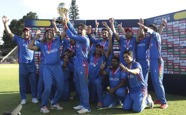 Afghanistan players celebrate after winning the trophy during their cricket world cup qualifier match against West Indies at Harare Afghanistan players celebrate after winning the trophy during their cricket world cup qualifier match against West Indies at Harare