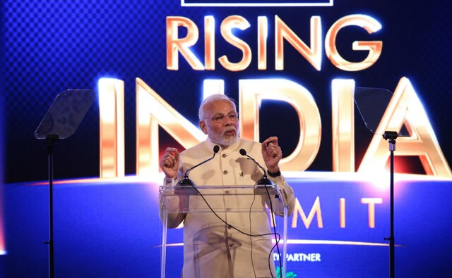 The prime minister also said that when anyone talks about India, it is a positive story. He also said that his government changed the tax system which earlier was unfriendly. News18 The prime minister also said that when anyone talks about India, it is a positive story. He also said that his government changed the tax system which earlier was unfriendly. News18