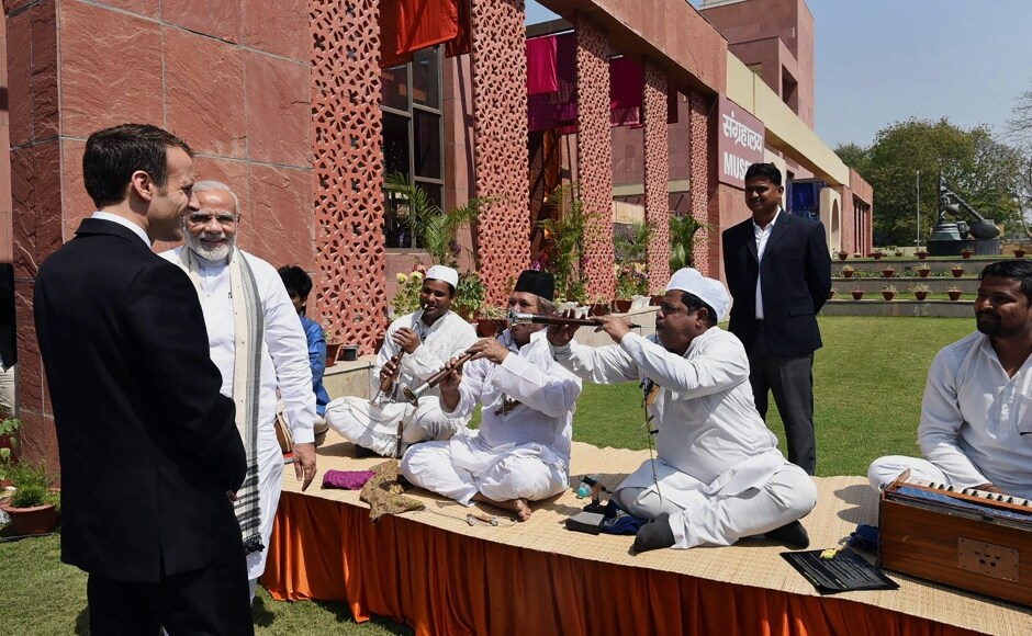 Macron, who had spent time at the Taj Mahal with his wife Brigitte on Sunday, was given a traditional welcome with the showering of flower petals, a shehnai recital and chanting of mantras before he took a decked-up boat which ferried him, Modi and Yogi Adityanath between Assi and Dashwamedh ghats. PTI Macron, who had spent time at the Taj Mahal with his wife Brigitte on Sunday, was given a traditional welcome with the showering of flower petals, a shehnai recital and chanting of mantras before he took a decked-up boat which ferried him, Modi and Yogi Adityanath between Assi and Dashwamedh ghats. PTI