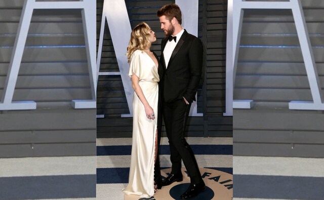 Miley Cyrus and Liam Hemsworth make an appearance together. Image from Twitter/@BritishVogue Miley Cyrus and Liam Hemsworth make an appearance together. Image from Twitter/@BritishVogue