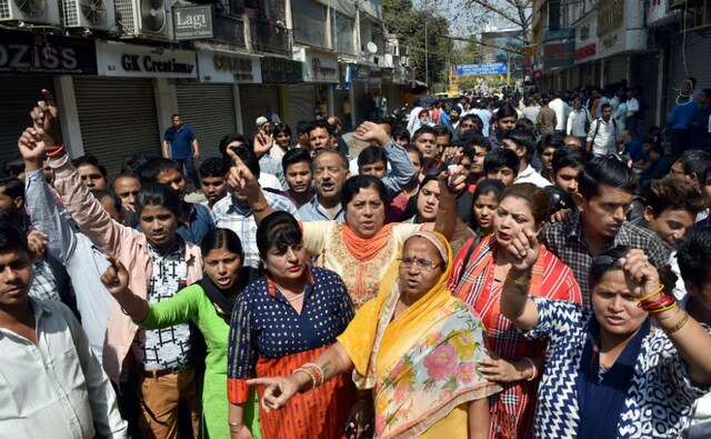 From Amar Colony Market to Karol Bagh, shopkeepers raised slogans and waved black flags to lodge their protest, under the banner of the Confederation of All India Traders. PTI From Amar Colony Market to Karol Bagh, shopkeepers raised slogans and waved black flags to lodge their protest, under the banner of the Confederation of All India Traders. PTI
