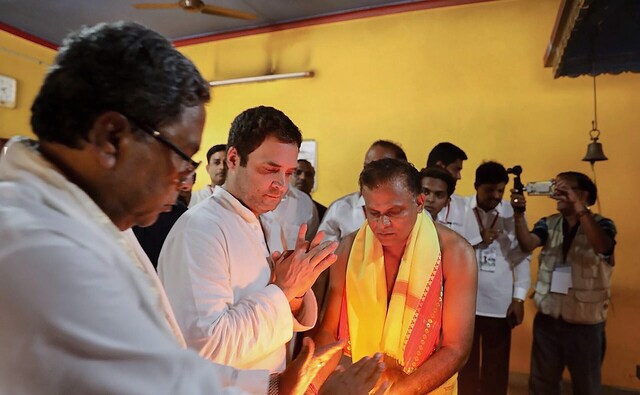 Later, Rahul visited the Sri Brahmashri Narayana Guru Mandira at Hejmady village and offered prayers. Chief Minister Siddaramaiah, too, offered his prayers. PTI Later, Rahul visited the Sri Brahmashri Narayana Guru Mandira at Hejmady village and offered prayers. Chief Minister Siddaramaiah, too, offered his prayers. PTI