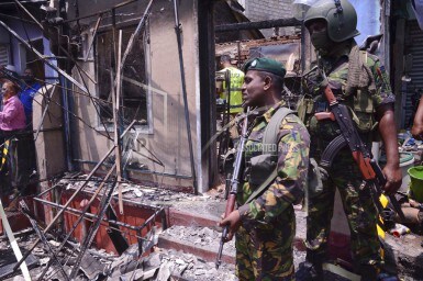 File image of Sri Lanka's security forces near a vandalised building in Digana. AP