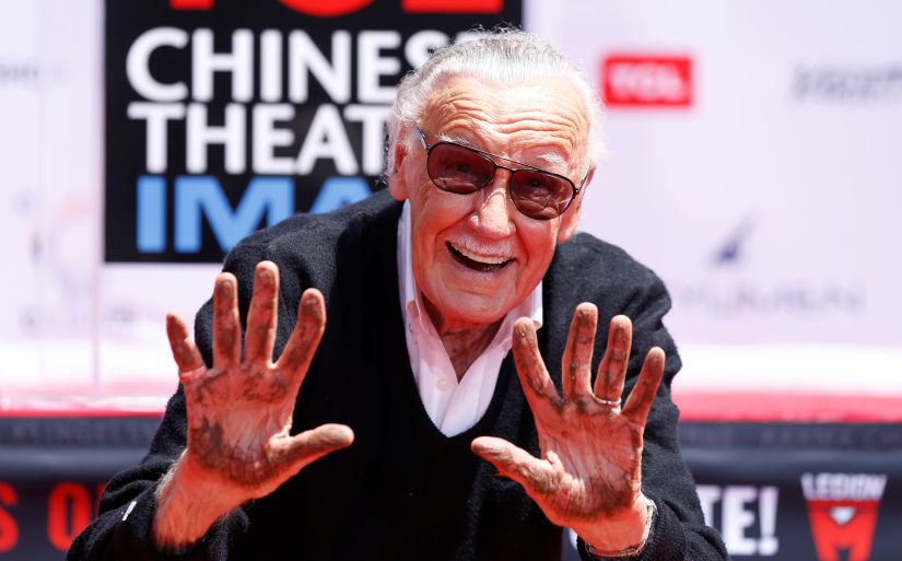 Marvel Comics co-creator Stan Lee shows his hands after placing them in cement during a ceremony in the forecourt of the TCL Chinese theatre in Los Angeles, California, U.S., July 18, 2017. REUTERS/Mario Anzuoni TPX IMAGES OF THE DAY - RC17453CF840