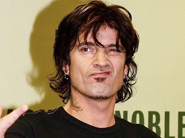Rocker Tommy Lee levels assault allegation against son Brandon, 21, with ex-wife Pamela Anderson