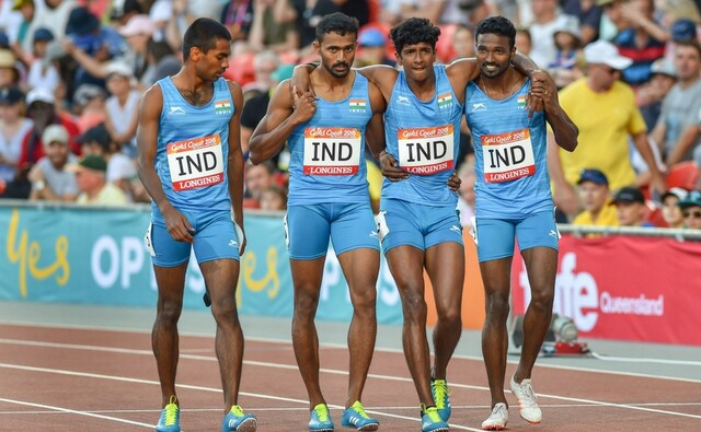 India's Kunhu Muhammed Puthanpurakkal, Arokia Rajiv, Muhammed Anas Yahiya help their injured teammate Amoj Jacob who fell during the Men's 4X400m Relay finals. PTI India's Kunhu Muhammed Puthanpurakkal, Arokia Rajiv, Muhammed Anas Yahiya help their injured teammate Amoj Jacob who fell during the Men's 4X400m Relay finals. PTI