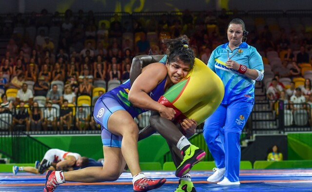 India's Sakshi Malik wrestles with Cameron's Berth Emillene Ngolle during the 62kg wrestling Nordic at the Commonwealth Games 2018. Sakshi won the bronze medal. PTI India's Sakshi Malik wrestles with Cameron's Berth Emillene Ngolle during the 62kg wrestling Nordic at the Commonwealth Games 2018. Sakshi won the bronze medal. PTI