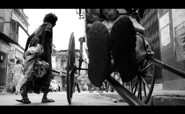 A day for one of these pullers typically begins at 4 am, ferrying packages to and from the Burrabazar or New Market areas, or the schoolchildren who happen to be their most regular customers. Photo by Satwik Paul. A day for one of these pullers typically begins at 4 am, ferrying packages to and from the Burrabazar or New Market areas, or the schoolchildren who happen to be their most regular customers. Photo by Satwik Paul.