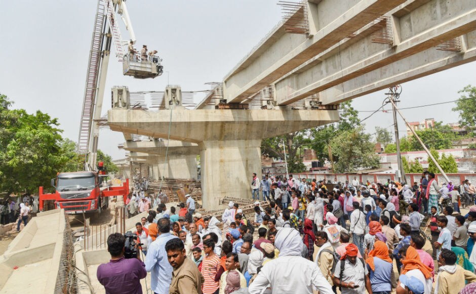 Three persons were pulled out alive of the crashed structure. Two persons admitted at a medical facility were said to be in a critical condition. The flyover was being constructed by the Uttar Pradesh State Bridge Corporation between Chauka Ghat bus stand and Lahartara. PTI Three persons were pulled out alive of the crashed structure. Two persons admitted at a medical facility were said to be in a critical condition. The flyover was being constructed by the Uttar Pradesh State Bridge Corporation between Chauka Ghat bus stand and Lahartara. PTI