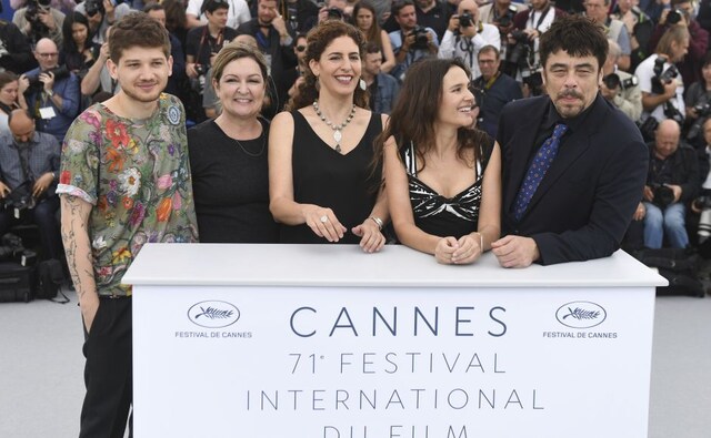 (From L-R) Kantemir Balagov, Julie Huntsinger, Annemarie Jacir, Virginie Ledoyen and Benicio Del Toro pose for photographers during a photo call for the Un Certain Regard jury. Photo by Arthur Mola/Invision/AP (From L-R) Kantemir Balagov, Julie Huntsinger, Annemarie Jacir, Virginie Ledoyen and Benicio Del Toro pose for photographers during a photo call for the Un Certain Regard jury. Photo by Arthur Mola/Invision/AP